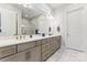 Elegant bathroom with double vanity, large mirror, and marble shower at 1025 Lake Como Dr, Monroe, NC 28110