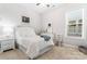 Bedroom with double bed and window at 1025 Lake Como Dr, Monroe, NC 28110