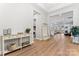 Spacious foyer with hardwood floors and coat rack at 1025 Lake Como Dr, Monroe, NC 28110