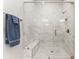 Large walk-in shower with marble tile and built in bench seat at 1025 Lake Como Dr, Monroe, NC 28110