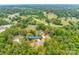 Beautiful aerial view of the home set within a lush, wooded landscape at 1037 Oakmont Dr, Rock Hill, SC 29732