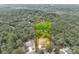 Beautiful aerial view of a home surrounded by mature trees and a lush landscape within clearly marked property lines at 1037 Oakmont Dr, Rock Hill, SC 29732