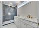 Modern bathroom with a dual vanity, marble countertops, and a tiled walk-in shower at 1037 Oakmont Dr, Rock Hill, SC 29732