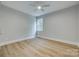 Minimal bedroom featuring neutral color palette and hardwood flooring at 1037 Oakmont Dr, Rock Hill, SC 29732