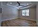 Bedroom features a ceiling fan, recessed lighting, and wood-look flooring at 1037 Oakmont Dr, Rock Hill, SC 29732