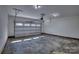 Spacious two-car garage with concrete floor and ample lighting at 1037 Oakmont Dr, Rock Hill, SC 29732