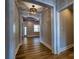 Hallway showcasing wood floors and bright, neutral-colored walls at 1037 Oakmont Dr, Rock Hill, SC 29732