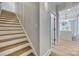 View of the stairs leading to the second floor with hardwood steps and white risers at 1037 Oakmont Dr, Rock Hill, SC 29732