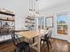 Farmhouse-style dining area with large windows at 116 Cedar Branch Ct, Mooresville, NC 28117