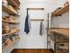 Well-organized pantry with ample shelving for food storage at 116 Cedar Branch Ct, Mooresville, NC 28117