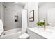 Cozy bathroom with white tiled walls and a shower-tub combination at 1305 39Th Avenue Ne Pl, Hickory, NC 28601