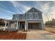 Charming two-story home featuring a welcoming porch and an attached two-car garage at 1305 39Th Avenue Ne Pl, Hickory, NC 28601