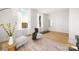 Airy living room showcasing hardwood floors, a decorative rug, and plush seating at 1305 39Th Avenue Ne Pl, Hickory, NC 28601