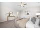 Calm main bedroom with vaulted ceilings, an ensuite bathroom view, a decorative mirror, and neutral tones at 1305 39Th Avenue Ne Pl, Hickory, NC 28601