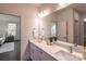 Elegant bathroom features a double vanity and a view into a bedroom at 1305 39Th Avenue Nw Pl, Hickory, NC 28601