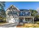 Two-story house with gray siding, white trim, and a two-car garage at 1305 39Th Avenue Nw Pl, Hickory, NC 28601