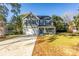 Two-story house with gray siding, blue shutters, and a large front yard at 1305 39Th Avenue Nw Pl, Hickory, NC 28601