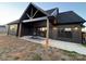 Covered patio with ceiling fan, seating area, and view of the backyard at 187 Lone Pine Rd, Statesville, NC 28625