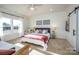 Bright bedroom with a queen bed, window, and neutral decor at 187 Lone Pine Rd, Statesville, NC 28625