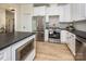 Modern kitchen with stainless steel appliances and dark countertops at 187 Lone Pine Rd, Statesville, NC 28625