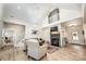 Open concept living room with high ceilings and a view of the kitchen and staircase at 187 Lone Pine Rd, Statesville, NC 28625