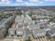 A well-maintained residential neighborhood is seen in this aerial view of neutral-colored townhomes near the city at 2013 Federation Ct, Charlotte, NC 28205