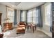 Bright bedroom sitting area with bay windows and comfortable seating at 2420 Valelake Rd, York, SC 29745