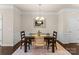 Bright dining room featuring a chandelier and hardwood floors at 2430 Kensington Station Pkwy, Charlotte, NC 28210