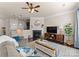 Cozy living room with fireplace and built-in shelving at 2430 Kensington Station Pkwy, Charlotte, NC 28210