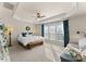 Spacious main bedroom with large windows and sitting area at 2430 Kensington Station Pkwy, Charlotte, NC 28210