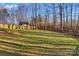 Large backyard with shed and trees at 2740 Hill Top Dr, Salisbury, NC 28147