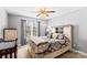 Bright bedroom with a comfortable bed and ample natural light at 2740 Hill Top Dr, Salisbury, NC 28147