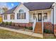 Front view of house with porch and landscaping at 2740 Hill Top Dr, Salisbury, NC 28147