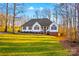 Ranch style home with a large yard and trees at 2740 Hill Top Dr, Salisbury, NC 28147