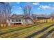 House with a deck and a sloped lawn at 2740 Hill Top Dr, Salisbury, NC 28147