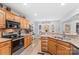 Modern kitchen with granite counters, stainless steel appliances, and ample cabinet space at 2740 Hill Top Dr, Salisbury, NC 28147