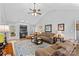 Bright living room with hardwood floors and a fireplace at 2740 Hill Top Dr, Salisbury, NC 28147