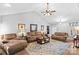 Relaxing living room featuring a cozy fireplace and hardwood floors at 2740 Hill Top Dr, Salisbury, NC 28147