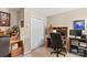 Home office with a desk, computer, and built-in shelving at 2740 Hill Top Dr, Salisbury, NC 28147