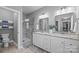 Elegant bathroom with double vanity and a glass shower at 3065 River Bend Dr, Tega Cay, SC 29708