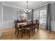 Elegant dining room with hardwood floors and a chandelier at 3065 River Bend Dr, Tega Cay, SC 29708