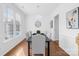 Elegant dining room with modern chandelier and large windows at 3304 Caernarvon Ct, Fort Mill, SC 29715