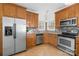 Well-equipped kitchen with stainless steel appliances and granite countertops at 3304 Caernarvon Ct, Fort Mill, SC 29715