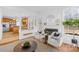 Stylish living room showcasing hardwood floors, fireplace and seamless connection to the kitchen at 3304 Caernarvon Ct, Fort Mill, SC 29715