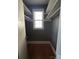 Spacious closet with built-in shelves and wood flooring at 352 7Th Nw St, Hickory, NC 28601