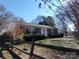 Brick home with a wood fence and spacious yard at 352 7Th Nw St, Hickory, NC 28601