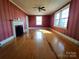 Spacious living room with hardwood floors and fireplace at 352 7Th Nw St, Hickory, NC 28601