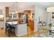 Bright dining area with wood floors and view to kitchen at 3624 Trent St, Charlotte, NC 28209