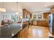 Modern kitchen with wood cabinets and granite counters at 3624 Trent St, Charlotte, NC 28209