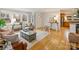 Bright living room, hardwood floors, view to kitchen at 3624 Trent St, Charlotte, NC 28209